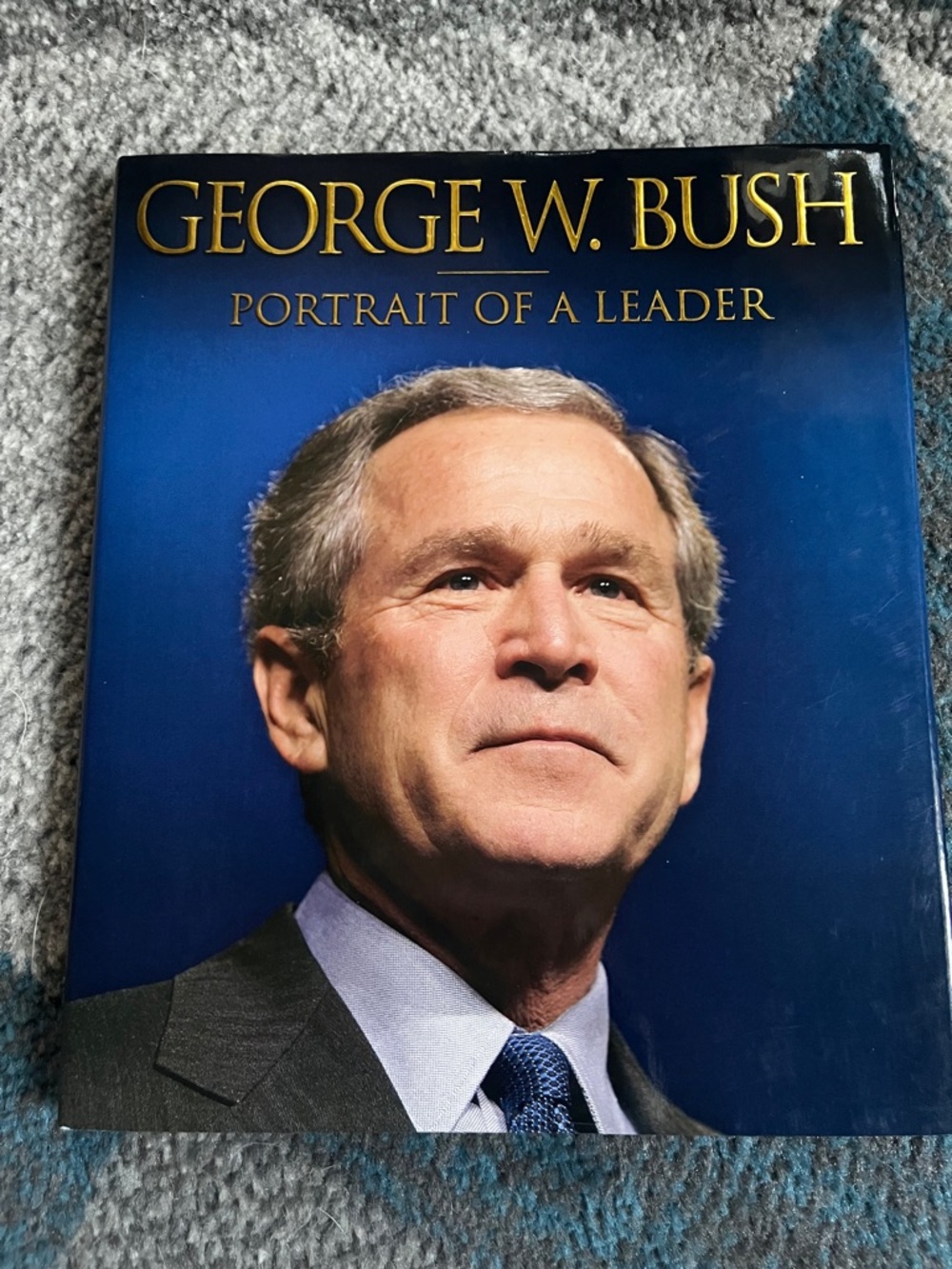 Portrait of a Leader Coffee Table Book - Navy Blue Cover